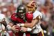LANDOVER, MD - SEPTEMBER 12: Matt Bowen #41 of the Washington Redskins sacks quarterback Brad Johnson #14 of the Tampa Bay Buccaneers in the fourth quarter for a 9 yard loss to bring up fourth down as the Redskins defeated the Buccaneers 16-10 on September 12, 2004 at FedEx Field in Landover, Maryland. (Photo by Doug Pensinger/Getty Images)
