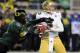 EUGENE, OR - DECEMBER 02 : Defensive end Dion Jordan #96 of the Oregon Ducks closes in on quarterback Kevin Prince #4 of the UCLA Bruins in the second quarter of the Pac-12 Championship game at Autzen Stadium on December 2, 2011 in Eugene, Oregon. (Photo by Steve Dykes/Getty Images)