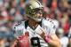CHICAGO, IL - OCTOBER 06: Drew Brees #9 of the New Orleans Saints looks for a receiver against the Chicago Bears at Soldier Field on October 6, 2013 in Chicago, Illinois. (Photo by Jonathan Daniel/Getty Images)