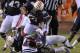 Oct 5, 2013; Auburn, AL, USA; Mississippi Rebels quarterback Barry Brunetti (11) is brought down by Auburn Tigers defensive end Carl Lawson (55) and defensive lineman Gabe Wright (90) during the second quarter at Jordan Hare Stadium. Mandatory Credit: Shanna Lockwood-USA TODAY Sports