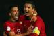 BELFAST, NORTHERN IRELAND - SEPTEMBER 06: Cristiano Ronaldo of Portugal celebrates scoring with team mate Joao Periera during the FIFA 2014 World Cup Qualifying Group F match between Northern Ireland and Portugal at Windsor Park on September 6, 2013 in Belfast, Northern Ireland. (Photo by Bryn Lennon/Getty Images)
