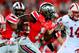 Sep 28, 2013; Columbus, OH, USA; Ohio State Buckeyes running back Dontre Wilson (1) returns a kick off return during the fourth quarter against the Wisconsin Badgers at Ohio Stadium. Ohio State Buckeyes defeated Wisconsin Badgers 31-24. Mandatory Credit: Andrew Weber-USA TODAY Sports