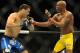 Jul 6, 2013; Las Vegas, NV, USA; Chris Weidman, blue shorts, defeated Anderson Silva (yellow shorts) in the second round with a TKO in their Middleweight Chamionship Bout at the MGM Grand Garden Arena. Mandatory Credit: Jayne Kamin-Oncea-USA TODAY Sports