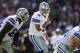 Oct 20, 2013; Philadelphia, PA, USA; Dallas Cowboys quarterback Tony Romo (9) adjusts protection during the second quarter against the Philadelphia Eagles at Lincoln Financial Field. Mandatory Credit: Howard Smith-USA TODAY Sports