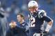 Oct 13, 2013; Foxborough, MA, USA; New England Patriots quarterback Tom Brady (12) warms up prior to a game against the New Orleans Saints at Gillette Stadium. Mandatory Credit: Mark L. Baer-USA TODAY Sports