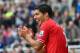 NEWCASTLE UPON TYNE, ENGLAND - OCTOBER 19: Luis Suarez of Liverpool claps during the Barclays Premier League match between Newcastle United and Liverpool at St James' Park on October 19, 2013 in Newcastle upon Tyne, England. (Photo by Julian Finney/Getty Images)