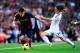 BARCELONA, SPAIN - OCTOBER 26: Lionel Messi of FC Barcelona duels for the ball with Luka Modric of Real Madrid CF during the La Liga match between FC Barcelona and Real Madrid CF at Camp Nou on October 26, 2013 in Barcelona, Spain. (Photo by David Ramos/Getty Images)