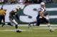 EAST RUTHERFORD, NJ - OCTOBER 20: Rob Gronkowski #87 of the New England Patriots runs from Antonio Allen #39 of the New York Jets during their game at MetLife Stadium on October 20, 2013 in East Rutherford, New Jersey. (Photo by Jeff Zelevansky/Getty Images)