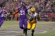 Oct 27, 2013; Minneapolis, MN, USA; Green Bay Packers wide receiver Jordy Nelson (87) catches a touchdown pass against Minnesota Vikings cornerback Josh Robinson (21) during the first quarter at Mall of America Field at H.H.H. Metrodome. Mandatory Credit: Brace Hemmelgarn-USA TODAY Sports
