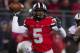 Oct 26, 2013; Columbus, OH, USA; Ohio State Buckeyes quarterback Braxton Miller (5) looks to pass the ball against the Penn State Nittany Lions at Ohio Stadium. Ohio State won 63-14. Mandatory Credit: Greg Bartram-USA TODAY Sports