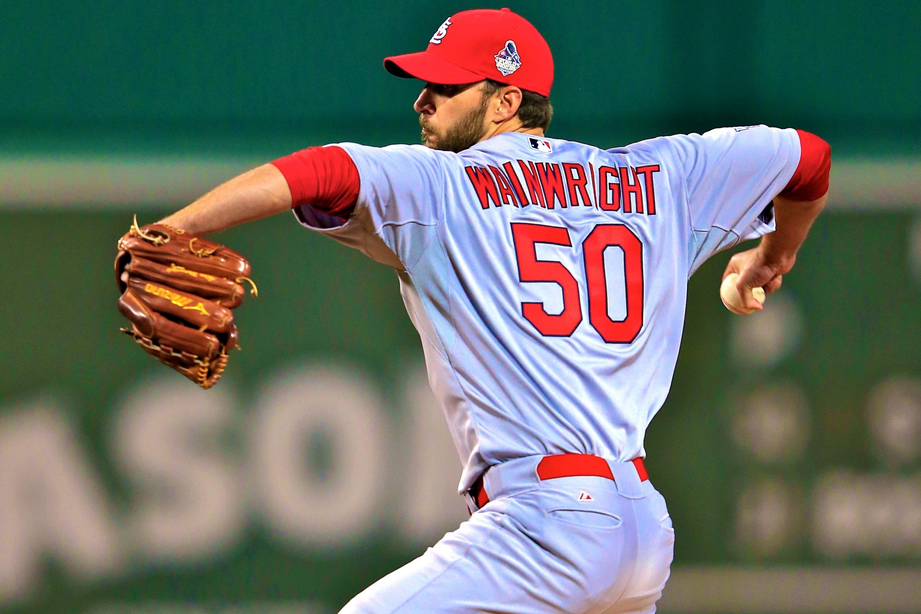 GIF: Wainwright, Molina let pop up fall between them 