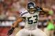 GLENDALE, AZ - OCTOBER 17: Outside linebacker Malcolm Smith #53 of the Seattle Seahawks celebrates after a sack against the Arizona Cardinals during the NFL game at the University of Phoenix Stadium on October 17, 2013 in Glendale, Arizona. The Seahawks defeated the Cardinals 34-22. (Photo by Christian Petersen/Getty Images)