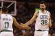 Oct 23, 2013; Boston, MA, USA; Boston Celtics center Vitor Faverani (38) and point guard Avery Bradley (0) react to a play against the Brooklyn Nets during the second quarter at TD Garden. Mandatory Credit: David Butler II-USA TODAY Sports
