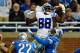 Dallas Cowboys wide receiver Dez Bryant had one spectacular touchdown grab, but it was Lions' Calvin Johnson who stole the show in Detroit on Sunday—much to Bryant's chagrin.