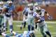 DETROIT, MI - OCTOBER 27: Terrance Williams #83 of the Dallas Cowboys scores on a sixty yard pass from Tony Romo #9 in the fourth quarter of the game against the Detroit Lions at Ford Field on October 27, 2013 in Detroit, Michigan. The Lions defeated the Cowboys 31-30. (Photo by Leon Halip/Getty Images)
