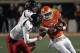 STILLWATER, OK - NOVEMBER 17: Wide receiver DeShawn Franklin #28 of the Oklahoma State Cowboys tries to shake cornerback Derrick Mays #4 and safety Cody Davis #16 of the Texas Tech Red Raiders November 17, 2012 at Boone Pickens Stadium in Stillwater, Oklahoma. Oklahoma State defeated Texas Tech 59-21. (Photo by Brett Deering/Getty Images)