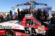 Darrell Wallace Jr. celebrates in Victory Lane at Martinsville Speedway.