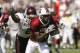 COLUMBIA, SC - OCTOBER 5: Troy Williamson #82 of USC runs from Korey Banks #2 of Miss. St. during the NCAA football game at Williams-Brice Stadium in Columbia, South Carolina on October 5, 2002. The University of South Carolina Gamecocks defeated the Mississippi State Bulldogs 34-10. (Photo by Craig Jones /Getty Images)