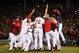 BOSTON, MA - OCTOBER 30: The Boston Red Sox celebrate after defeating the St. Louis Cardinals in Game Six of the 2013 World Series at Fenway Park on October 30, 2013 in Boston, Massachusetts. The Boston Red Sox defeated the St. Louis Cardinals 6-1. (Photo by Rob Carr/Getty Images)