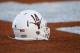 Sep 21, 2013; Austin, TX, USA; Texas Longhorns quarterback David Ash's helmet sits on the field during warmups before a football game against the Kansas State Wildcats at Darrell K Royal-Texas Memorial Stadium. Mandatory Credit: Jim Cowsert-USA TODAY Sports