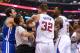Oct 31, 2013; Los Angeles, CA, USA; NBA referee Mark Ayotte (56) and Los Angeles Clippers power forward Blake Griffin (32) separate center DeAndre Jordan (6) after he was fouled by Golden State Warriors center Andrew Bogut (far left) in the second quarter of the game at Staples Center. Mandatory Credit: Jayne Kamin-Oncea-USA TODAY Sports