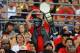 Aug 31, 2013; San Diego, CA, USA; A fan in the San Diego State Aztecs student section holds a championship belt during the first half against the Eastern Illinois Panthers at Qualcomm Stadium. Mandatory Credit: Christopher Hanewinckel-USA TODAY Sports