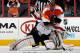 PHILADELPHIA, PA - NOVEMBER 01: Ray Emery #29 of the Philadelphia Flyers fights with Braden Holtby #70 of the Washington Capitals during the third period at the Wells Fargo Center on November 1, 2013 in Philadelphia, Pennsylvania. The Capitals shutout the Flyers 7-0. (Photo by Bruce Bennett/Getty Images)