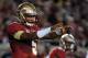 Nov 2, 2013; Tallahassee, FL, USA; Florida State Seminoles quarterback Jameis Winston (5) before a snap during the first half against the Miami Hurricanes during the first half at Doak Campbell Stadium. Mandatory Credit: Melina Vastola-USA TODAY Sports