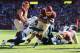LANDOVER, MD - NOVEMBER 03: Alfred Morris #46 of the Washington Redskins rushes for a second quarter touchdown whilie being tackled by Eric Weddle #32 of the San Diego Chargers at FedExField on November 3, 2013 in Landover, Maryland. (Photo by Rob Carr/Getty Images)