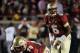 Nov 2, 2013; Tallahassee, FL, USA; Florida State Seminoles quarterback Jameis Winston (5) prepares to take the snap from center Josue Matias (70) during the game against the Miami Hurricanes at Doak Campbell Stadium. Mandatory Credit: Melina Vastola-USA TODAY Sports