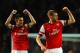 LONDON, ENGLAND - NOVEMBER 02: Laurent Koscielny of Arsenal and Per Mertesacker of Arsenal celebrate victory at the final whistle during the Barclays Premier League match between Arsenal and Liverpool at Emirates Stadium on November 2, 2013 in London, England. (Photo by Laurence Griffiths/Getty Images)
