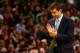 BOSTON, MA - NOVEMBER 01: Head coach Brad Stevens cheers on his team against the Milwaukee Bucks in the first half during the home opener at TD Garden on November 1, 2013 in Boston, Massachusetts. NOTE TO USER: User expressly acknowledges and agrees that, by downloading and or using this photograph, User is consenting to the terms and conditions of the Getty Images License Agreement. (Photo by Jared Wickerham/Getty Images)