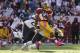 Oct 20, 2013; Landover, MD, USA; Washington Redskins running back Alfred Morris (46) carries the ball as Chicago Bears free safety Chris Conte (47) and Bears strong safety Major Wright (21) make the tackle in the third quarter at FedEx Field. The Redskins won 45-41. Mandatory Credit: Geoff Burke-USA TODAY Sports
