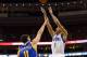 Nov 4, 2013; Philadelphia, PA, USA; Philadelphia 76ers guard Michael Carter-Williams (1) shoots a jump shot over the defense of Golden State Warriors guard Klay Thompson (11) during the first quarter at Wells Fargo Center. Mandatory Credit: Howard Smith-USA TODAY Sports