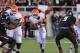LUBBOCK, TX - NOVEMBER 2: Desmond Roland #26 of the Oklahoma State Cowboys rushes the ball against the Texas Tech Red Raiders during game action on November 2, 2013 at AT&T Jones Stadium in Lubbock, Texas. Oklahoma State won the game 52-34. (Photo by John Weast/Getty Images)