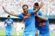NAPLES, ITALY - OCTOBER 27: Gonzalo Higuain of Napoli celebrates with team-mates after scoring the second goal during the Serie A match between SSC Napoli and Torino FC at Stadio San Paolo on October 27, 2013 in Naples, Italy. (Photo by Giuseppe Bellini/Getty Images)