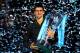 LONDON, ENGLAND - NOVEMBER 12: Novak Djokovic of Serbia lifts the trophy as he celebrates victory after his men's singles final match against Roger Federer of Switzerland during day eight of the ATP World Tour Finals at O2 Arena on November 12, 2012 in London, England. (Photo by Julian Finney/Getty Images)
