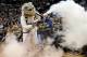 Oct 30, 2013; Minneapolis, MN, USA; Minnesota Timberwolves mascot Crunch dressed as a Ghostbuster during the second quarter against the Orlando Magic at Target Center. The Timberwolves defeated the Magic 120-115 in overtime. Mandatory Credit: Brace Hemmelgarn-USA TODAY Sports