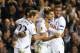 LONDON, ENGLAND - NOVEMBER 07: Erik Lamela of Spurs celebrates scoring their first goal with Kyle Walker and Christian Eriksen of Spurs during the UEFA Europa League Group K match between Tottenham Hotspur FC and FC Sheriff at White Hart Lane on November 7, 2013 in London, England. (Photo by Ian Walton/Getty Images)
