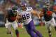 CHICAGO, IL - SEPTEMBER 15: John Carlson #89 of the Minnesota Vikings is chased by James Anderson #50 and Stephen Paea #92 of the Chicago Bears at Soldier Field on September 15, 2013 in Chicago, Illinois. The Bears defeated the Vikings 31-30. (Photo by Jonathan Daniel/Getty Images)