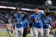 DETROIT, MI - OCTOBER 27: Dylan Gandy #65 and Joique Bell #35 of the Detroit Lions of the Detroit Lions acknowledges fans while leaving the field after a 31-30 win over the Dallas Cowboys at Ford Field on October 27, 2013 in Detroit, Michigan. (Photo by Gregory Shamus/Getty Images)