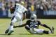 OAKLAND, CA - SEPTEMBER 15: Cornerback DJ Hayden #25 of the Oakland Raiders manages to tackle wide receiver Cecil Shorts III #84 of the Jacksonville Jaguars while seated in the second quarter on September 15, 2013 at O.co Coliseum in Oakland, California. (Photo by Brian Bahr/Getty Images)