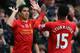 LIVERPOOL, ENGLAND - NOVEMBER 09: Luis Suarez of Liverpool celebrates scoring the third goal with his team-mate Daniel Sturridge during the Barclays Premier League match between Liverpool and Fulham at Anfield on November 9, 2013 in Liverpool, England. (Photo by Alex Livesey/Getty Images)