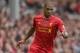 LIVERPOOL, ENGLAND - AUGUST 17: Glen Johnson of Liverpool in action during the Barclays Premier League match between Liverpool and Stoke City at Anfield on August 17, 2013 in Liverpool, England. (Photo by Clive Brunskill/Getty Images)