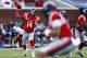 OXFORD, MISSISSIPPI - NOVEMBER 9: Bo Wallace #14 of the Ole Miss Rebels throws a pass against the Arkansas Razorbacks at Vaught-Hemingway Stadium on November 9, 2013 in Oxford, Mississippi. (Photo by Wesley Hitt/Getty Images)