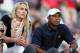 Oct 3, 2013; Dublin, OH, USA; Lindsey Vonn and Tiger Woods watch from the 17th green during the Presidents Cup at Muirfield Village Golf Club. Mandatory Credit: Brian Spurlock-USA TODAY Sports