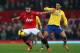 MANCHESTER, ENGLAND - NOVEMBER 10: Robin van Persie of Manchester United competes with Mikel Arteta of Arsenal during the Barclays Premier League match between Manchester United and Arsenal at Old Trafford on November 10, 2013 in Manchester, England. (Photo by Alex Livesey/Getty Images)