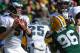 Nov 10, 2013; Green Bay, WI, USA; Philadelphia Eagles quarterback Nick Foles (9) prepares to throw the ball against the Green Bay Packers in the first quarter at Lambeau Field. Mandatory Credit: Benny Sieu-USA TODAY Sports