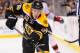 BOSTON, MA - OCTOBER 26: Reilly Smith #18 of the Boston Bruins passes the puck against the New Jersey Devils at the TD Garden on October 26, 2013 in Boston, Massachusetts. (Photo by Brian Babineau/NHLI via Getty Images)