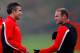 MANCHESTER, ENGLAND - OCTOBER 01: Wayne Rooney (R) and Robin van Persie of Manchester United talk during a training session ahead of their Champions League Group A match against Shakhtar Donetsk at their Carrington Training Complex on October 01, 2013 in Manchester, England (Photo by Paul Thomas/Getty Images)